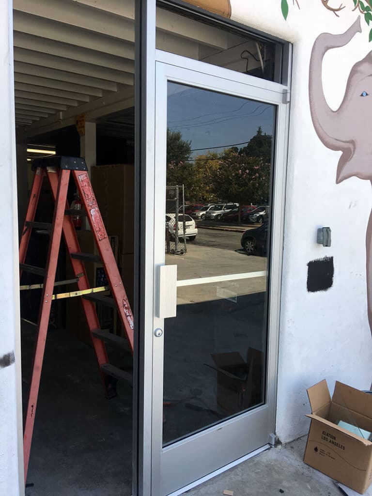 anthonys glass and mirrors commercial installation store entrance window replacement